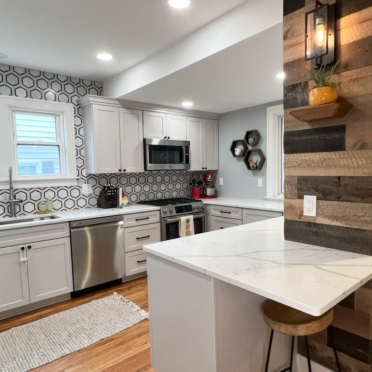modern kitchen renovation with wooden accents and textured backsplash