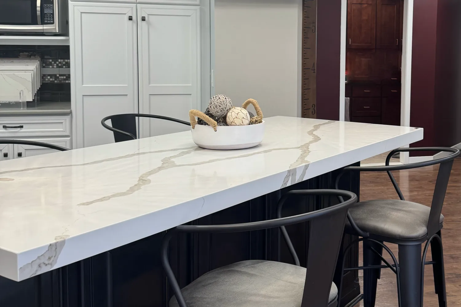 stone countertop island in large kitchen
